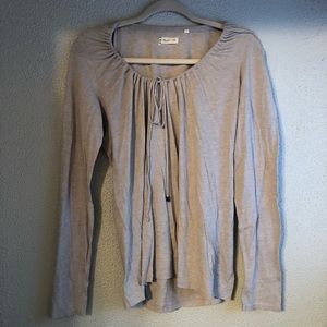 Soft long sleeved top with gathered collar and tie
